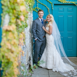 Beautiful Bride & Groom in Front of Turquoise Door