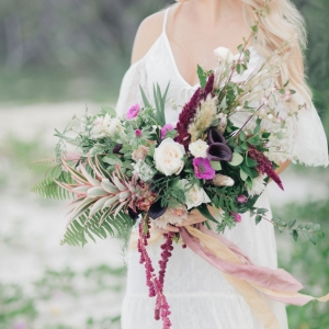 Burgundy, green, and gold bohemian bouquet 