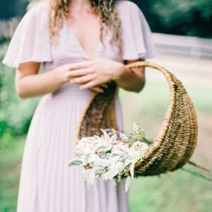 Bride with basket of flowers