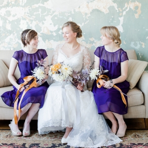 Bride with bridesmaids in pretty purple