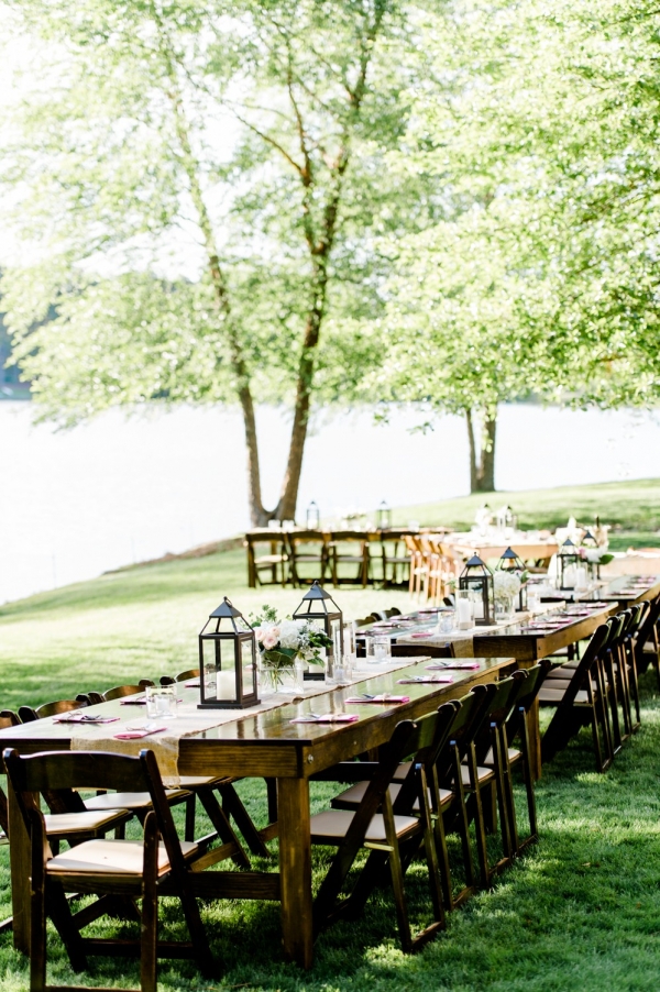 Wooden Lakeside Reception Tables With Lanterns