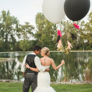 Bride And Groom With Black And White Balloons
