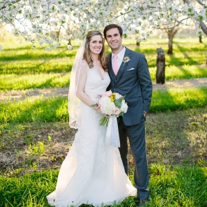 Bride And Groom In Cherry Tree Orchard