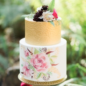 Gold, ivory and pink painted wedding cake