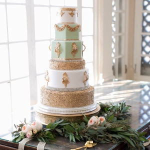 Gold, mint and ivory tiered wedding cake