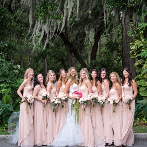 Elegant southern bride with pretty bridesmaids in blush dresses