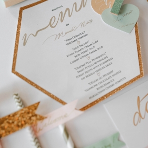 Gold and mint wedding details