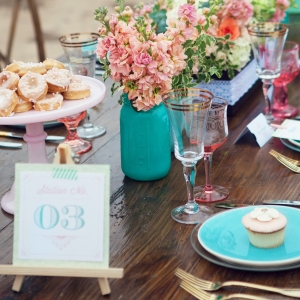 Turquoise place and mason jars with gold flatware