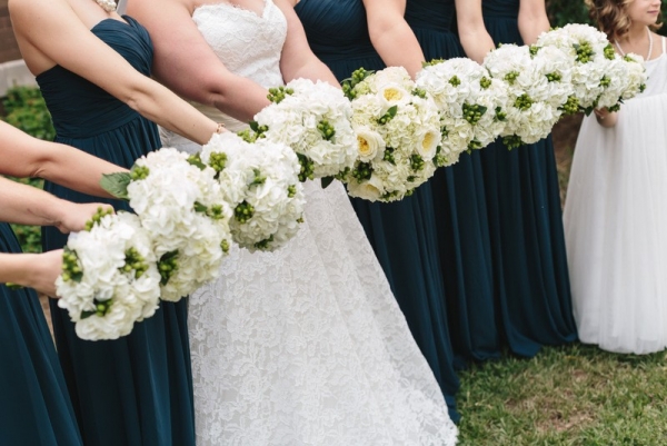 bridal party with flowers 