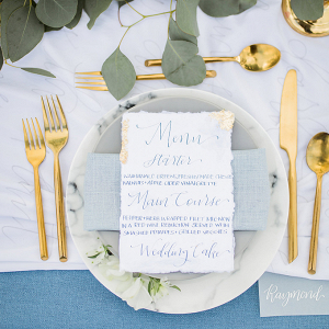 Blue and gold place setting