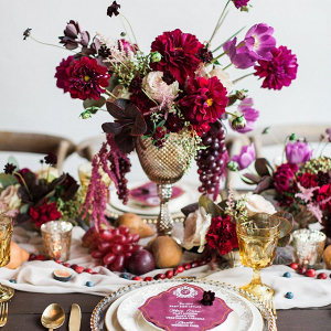 Lush burgundy wedding tablescape