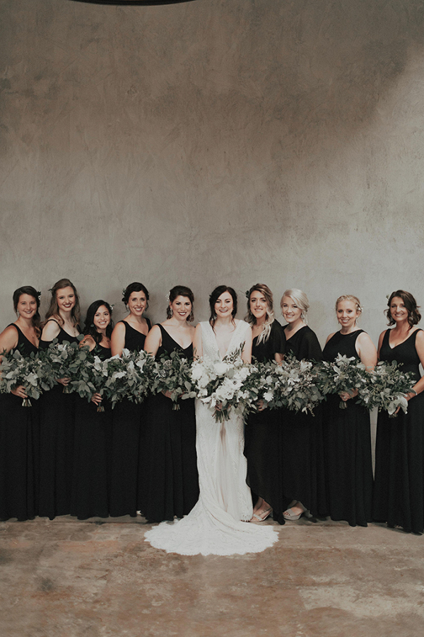 Bridesmaids in long black dresses