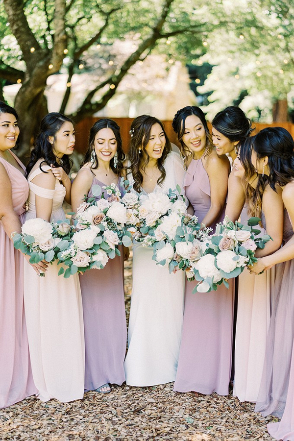 Mismatched blush and lavender bridesmaid dresses