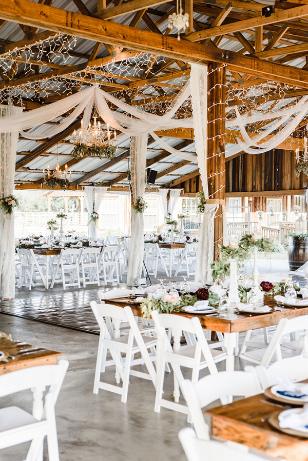Barn wedding with draping and string lights