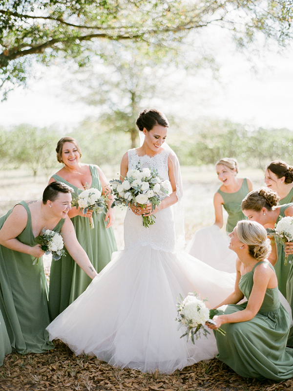 Bridesmaids in sage gowns