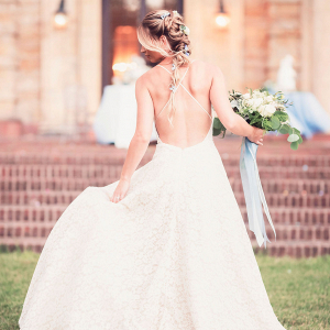 bride with open back wedding gown on Connecticut estate