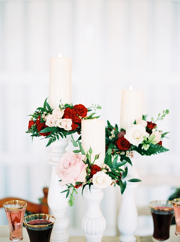 Rustic Centerpieces with Floral Wreaths around Pillar Candles
