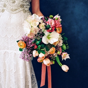 Colorful Bridal Bouquet with an Embellished Lace Wedding Dress