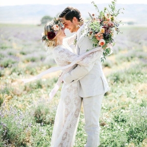 Romantic Bohemian Wedding Portraits in a Field of Wildflowers