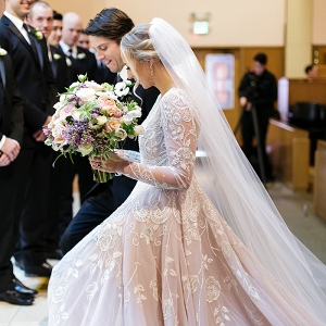 Glamorous Church Wedding Ceremony with a Princess Wedding Dress and a Cathedral Veil