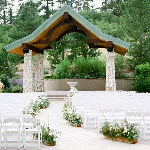 Elegant Mountain Wedding Ceremony with Wildflower Aisle Decor