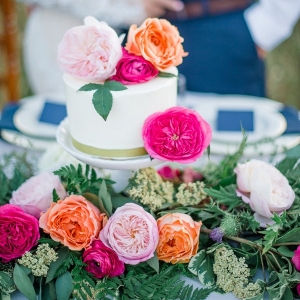 One Tier Wedding Cake Topped with Colorful Flowers!