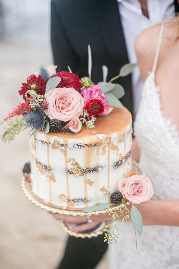 Bride Holding a Caramel Drizzle Cake