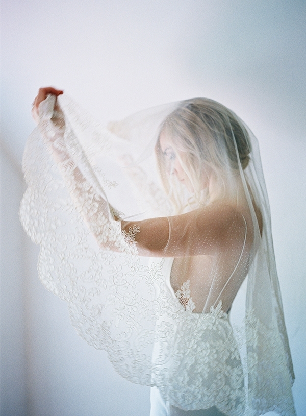Bride in a Romantic Lace Trimmed Veil