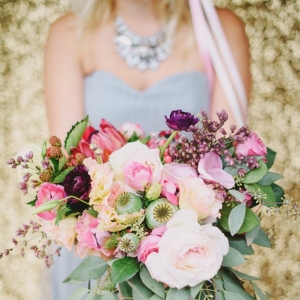 A Pink and Blush Spring Bouquet with a Lilac Gray Wedding Dress