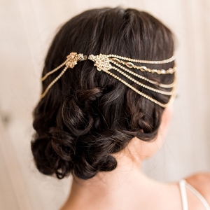 Loose and Elegant Bridal Updo with a Jeweled Headpiece