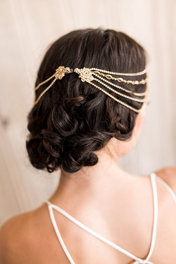 Loose and Elegant Bridal Updo with a Jeweled Headpiece