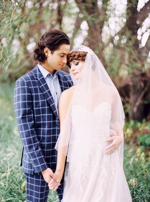 Modern Bride and Groom with a Blush Wedding Dress and a Patterned Suit