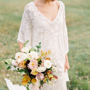 Beaded Lace Wedding Dress with an Autumn Bouquet