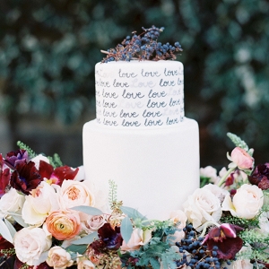 Love Letter Wedding Cake with a Floral Wreath