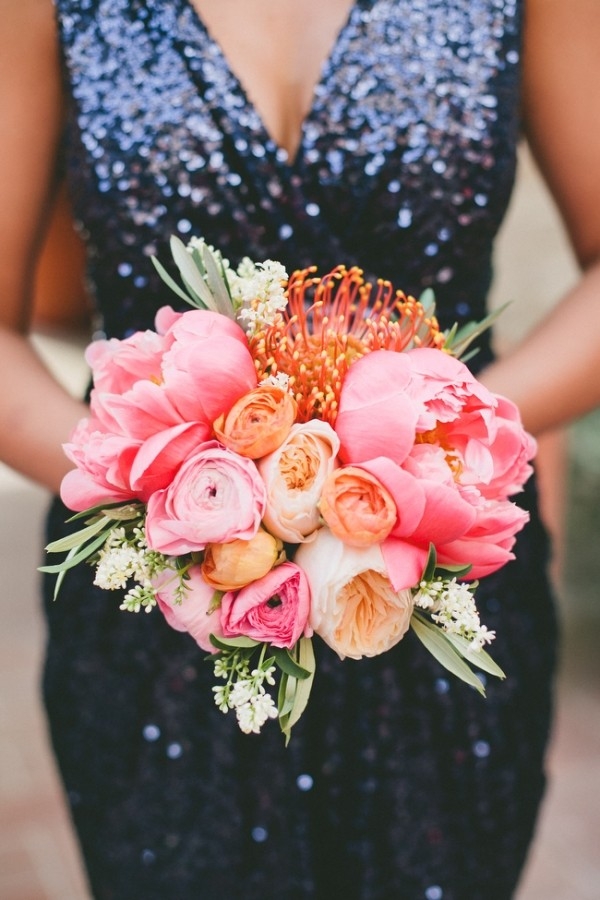 Navy Sequin Bridesmaid Dress with a Coral Peony Bouquet