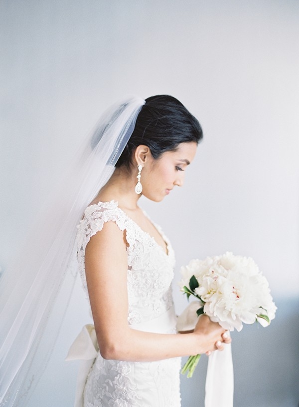 Romantic Veiled Bridal Portrait with a White Peony Bouquet