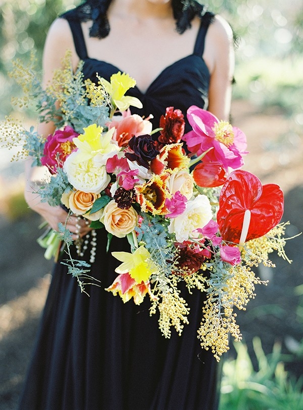 Vibrant Yellow and Pink Bouquet with a Black Wedding Dress
