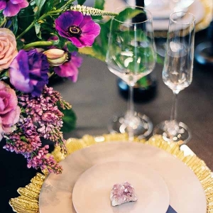 Purple and Gold Place Setting with Fresh Flowers and Raw Gemstones