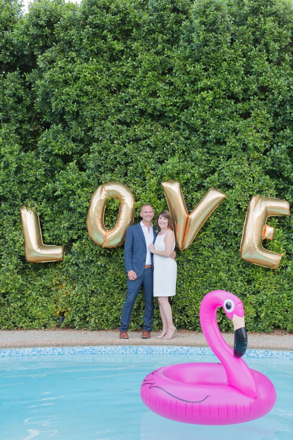 Intimate Palm Springs Destination Wedding - love letter balloons with pink flamingo