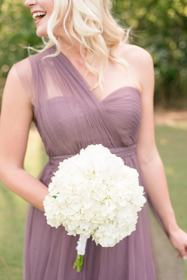lavender bridesmaid dress and all white bouquet