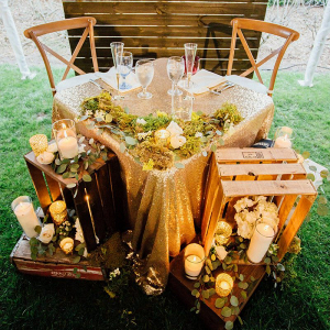 Outdoor-Shabby-Chic-Wedding-sweethert-table-with-gold-sequin-linen