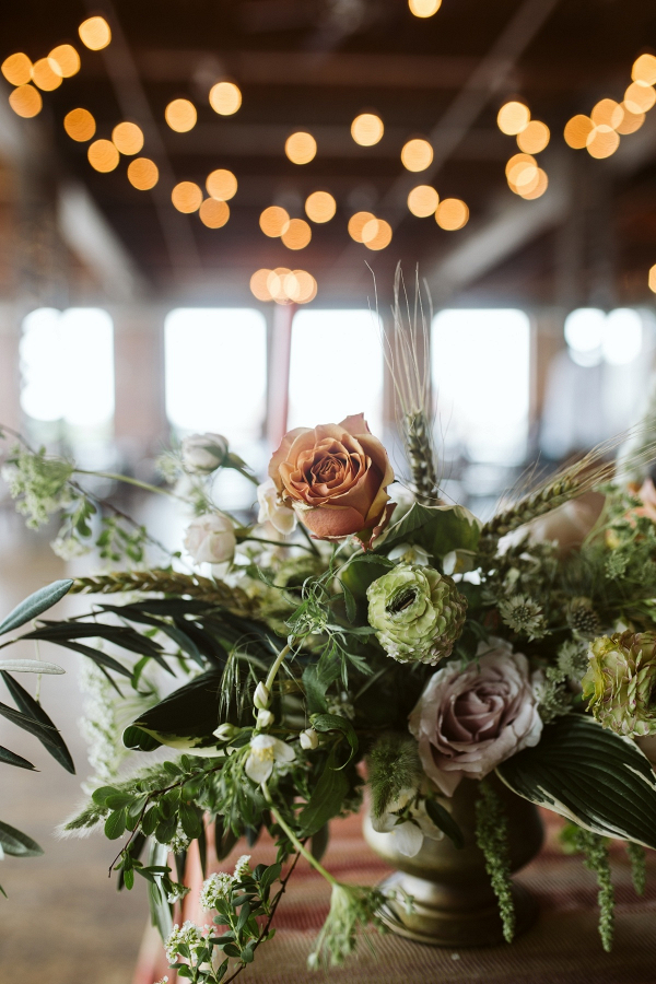 Wild greenery and rose centerpieces