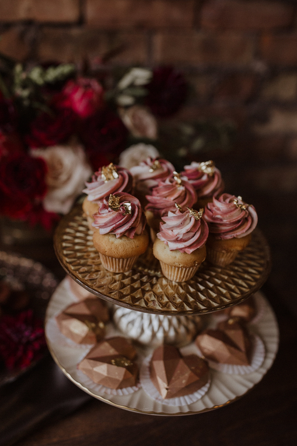 Pink cupcakes with gold leaf