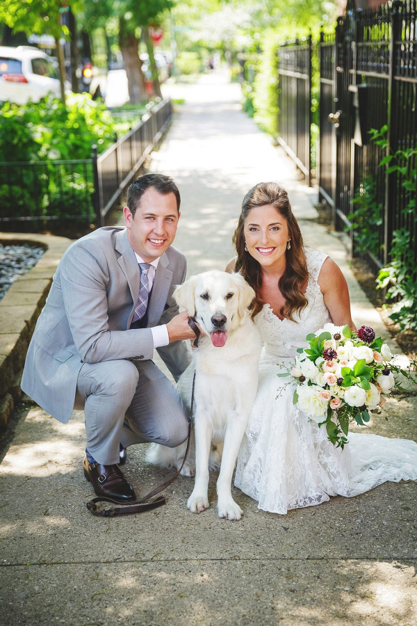 Bride and groom and dog wedding portrait