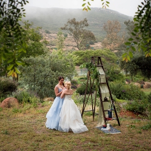 Ladder wedding decor with two brides