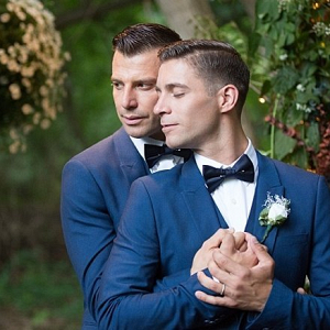 Grooms in blue suits