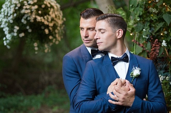 Grooms in blue suits