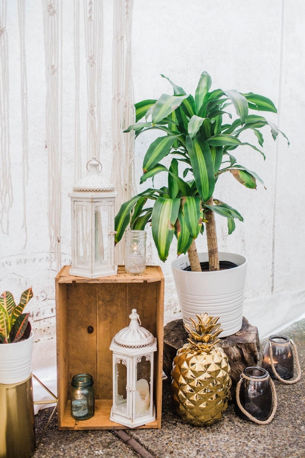 white-lanterns-gold-pineapples-potted-greenery