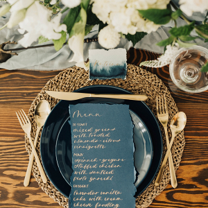 Gold and deep blue place setting