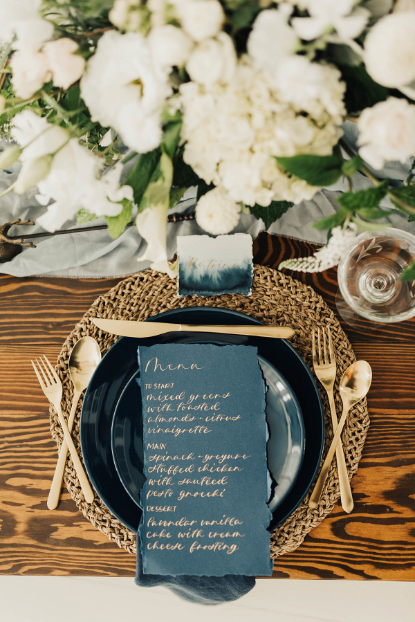 Gold and deep blue place setting